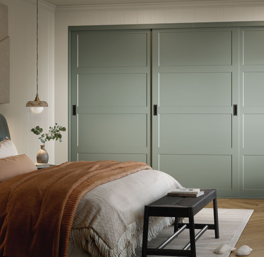 A bedroom with Reed Green Caraway Classic Square Glide Frameless doors